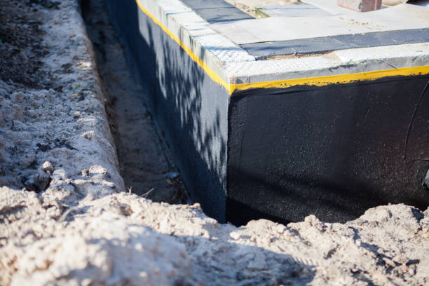 Professional Waterproofing technician working in Lena, WI